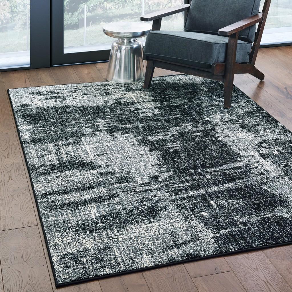 9' x 12' Black Ivory Machine Woven Abstract Indoor Area Rug