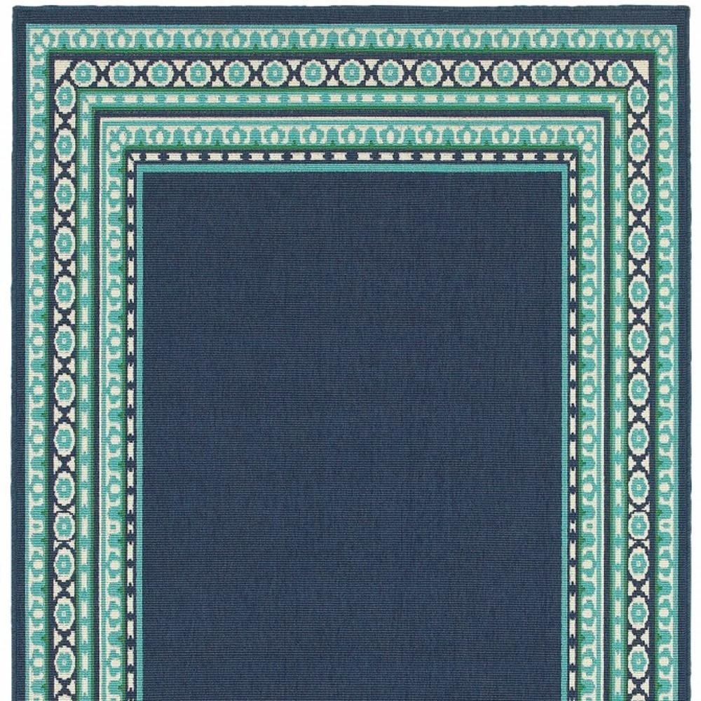 5’x8’ Navy and Green Geometric Indoor Outdoor Area Rug