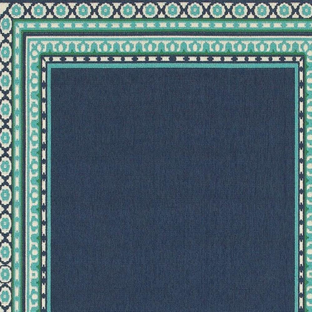 7’x10’ Navy and Green Geometric Indoor Outdoor Area Rug