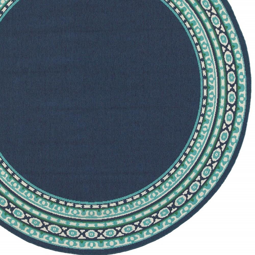 8’ Round Navy and Green Geometric Indoor Outdoor Area Rug