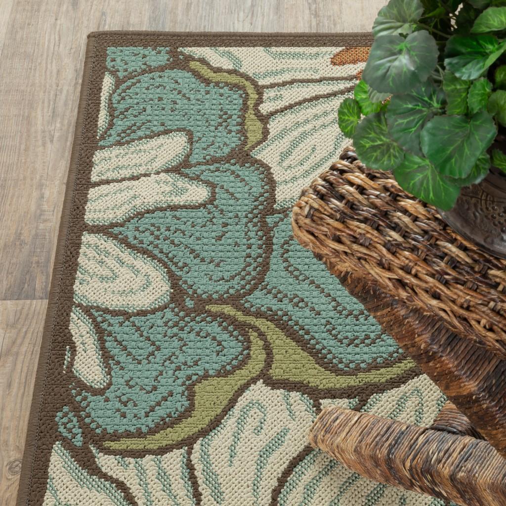 8’x11’ Blue and Brown Floral Indoor Outdoor Area Rug