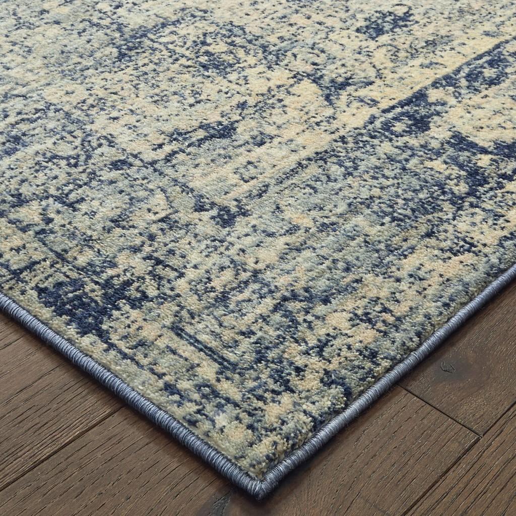 8’x11’ Ivory and Blue Oriental Area Rug