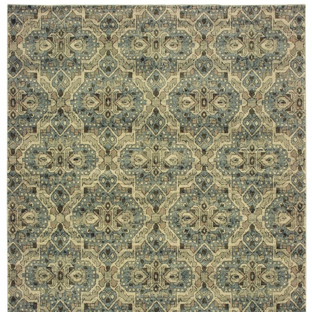 7’x10’ Ivory and Blue Geometric Area Rug