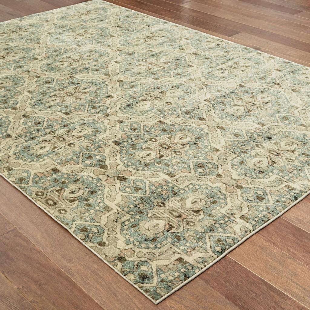 8’x11’ Ivory and Blue Geometric Area Rug