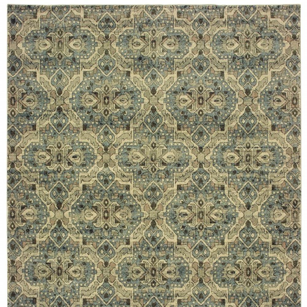 8’x11’ Ivory and Blue Geometric Area Rug