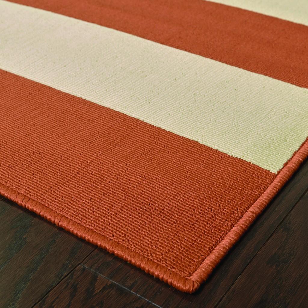 5’x8’ Orange and Ivory Striped Indoor Outdoor Area Rug