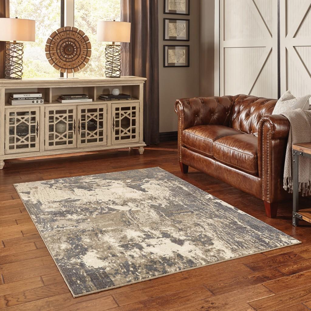 7’x10’ Gray and Ivory Abstract Area Rug