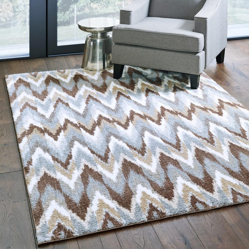 8’x11’ Gray and Taupe Ikat Pattern Area Rug