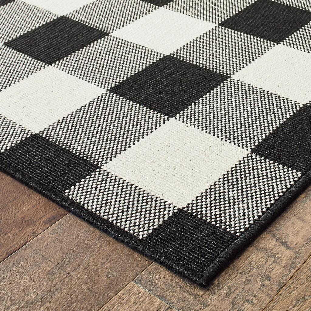 5’x8’ Black and Ivory Gingham Indoor Outdoor Area Rug