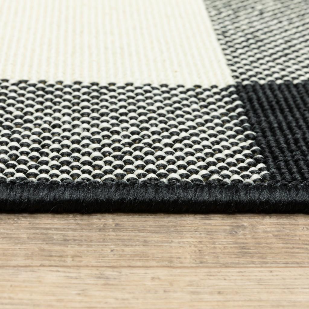 8’x11’ Black and Ivory Gingham Indoor Outdoor Area Rug