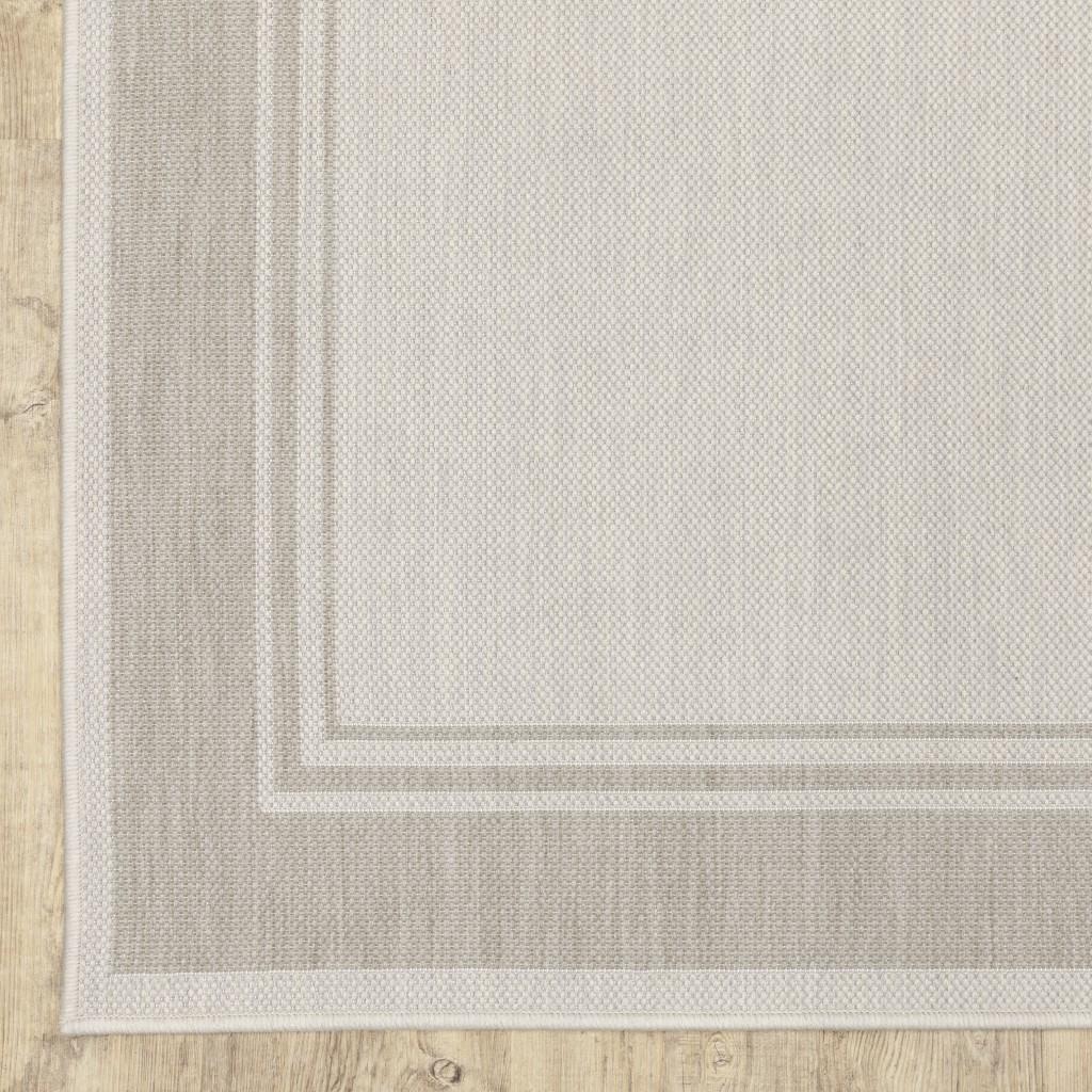 5’x7’ Ivory and Gray Bordered Indoor Outdoor Area Rug