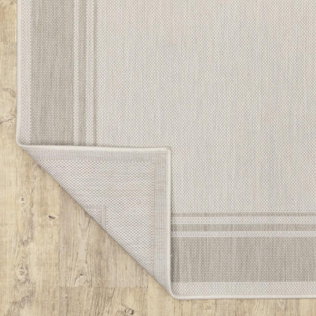 7’x9’ Ivory and Gray Bordered Indoor Outdoor Area Rug