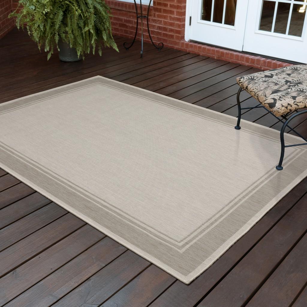 7’x9’ Ivory and Gray Bordered Indoor Outdoor Area Rug