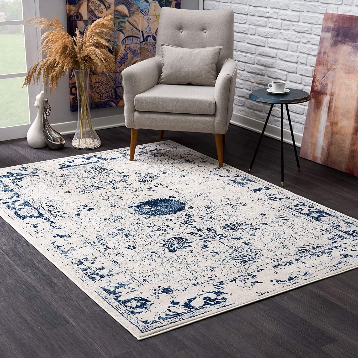 8’ x 11’ Navy Blue Distressed Floral Area Rug