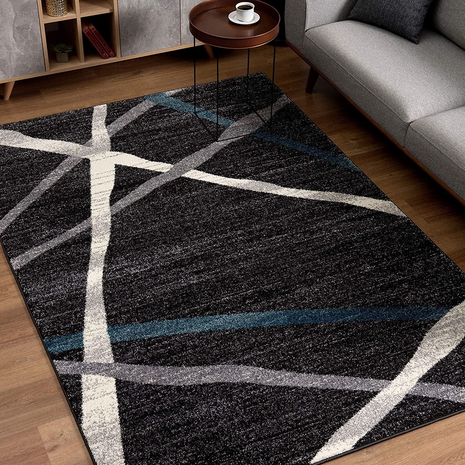 8’ x 11’ Distressed Black and Gray Abstract Area Rug