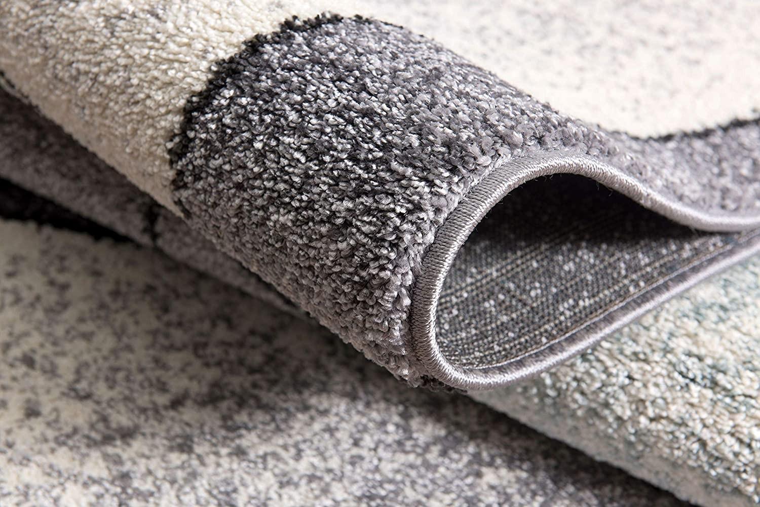 7’ x 9’ Gray and Blue Prism Pattern Area Rug