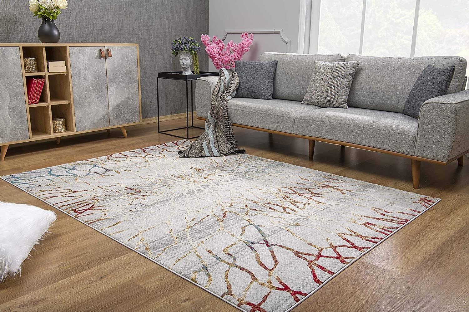 5’ x 8’ Gold and Ivory Abstract Branches Area Rug