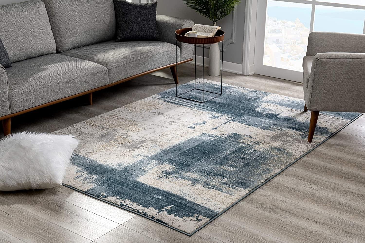 8’ x 11’ Cream and Blue Abstract Patches Area Rug