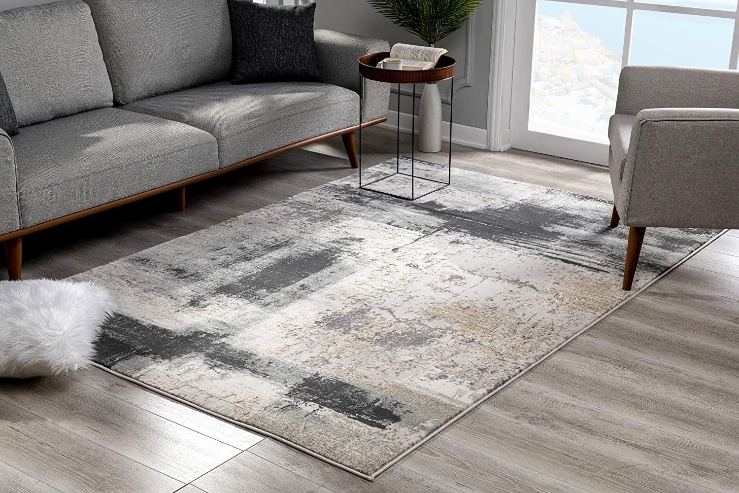 8’ x 11’ Cream and Gray Abstract Patches Area Rug