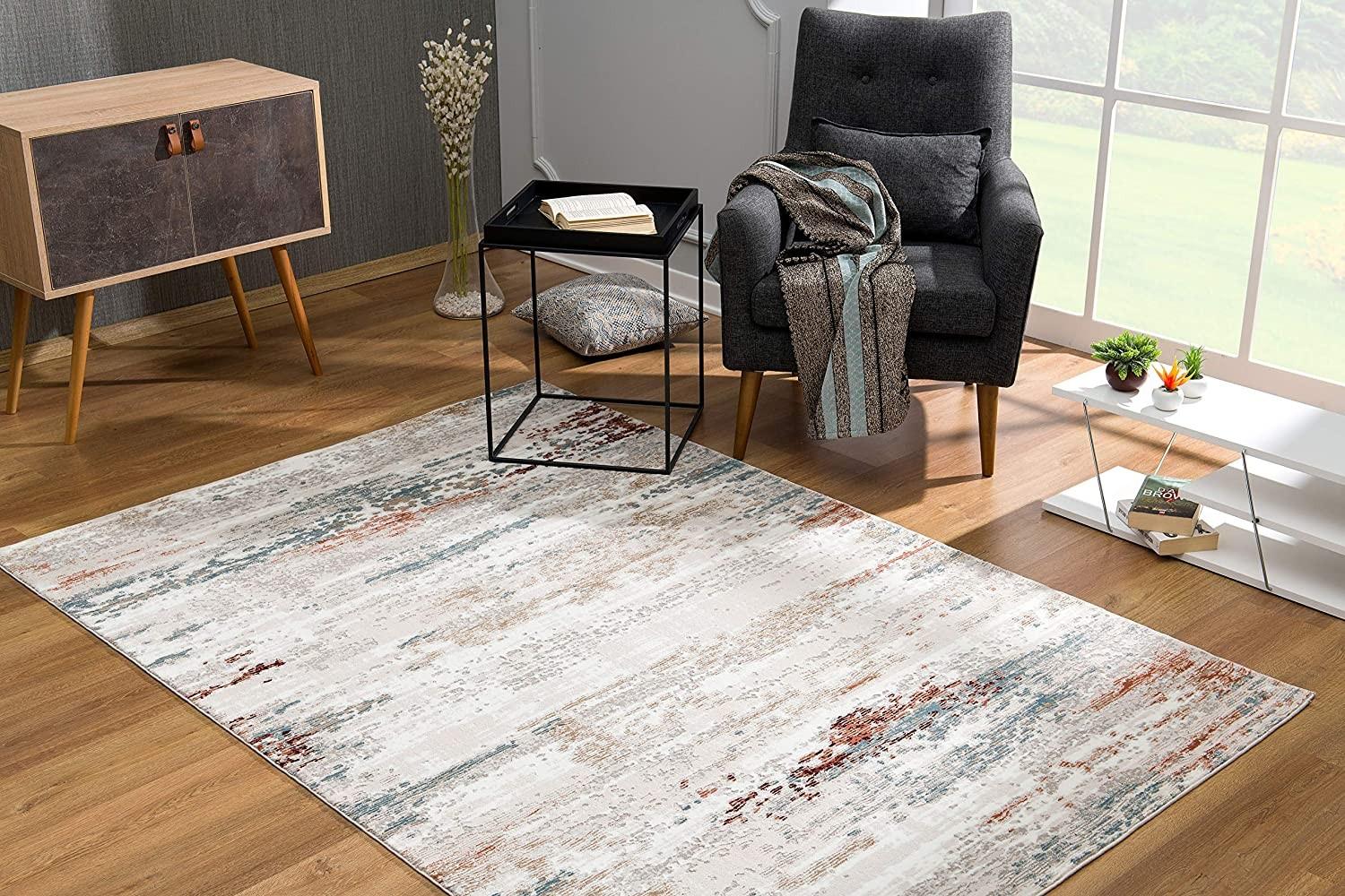 5’ x 8’ Gray and Ivory Abstract Stria Area Rug