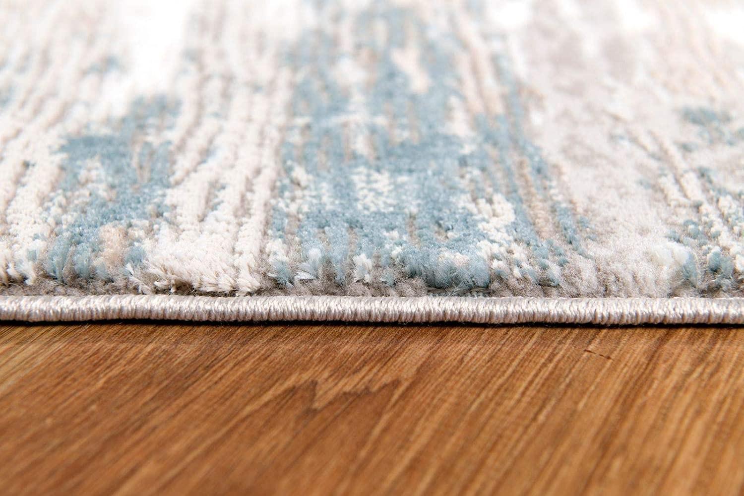 7’ x 10’ Gray and Ivory Abstract Stria Area Rug