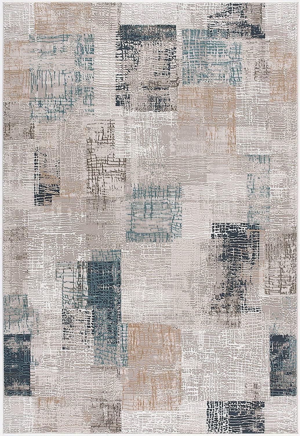 7’ x 10’ Blue and Ivory Distressed Diamonds Area Rug