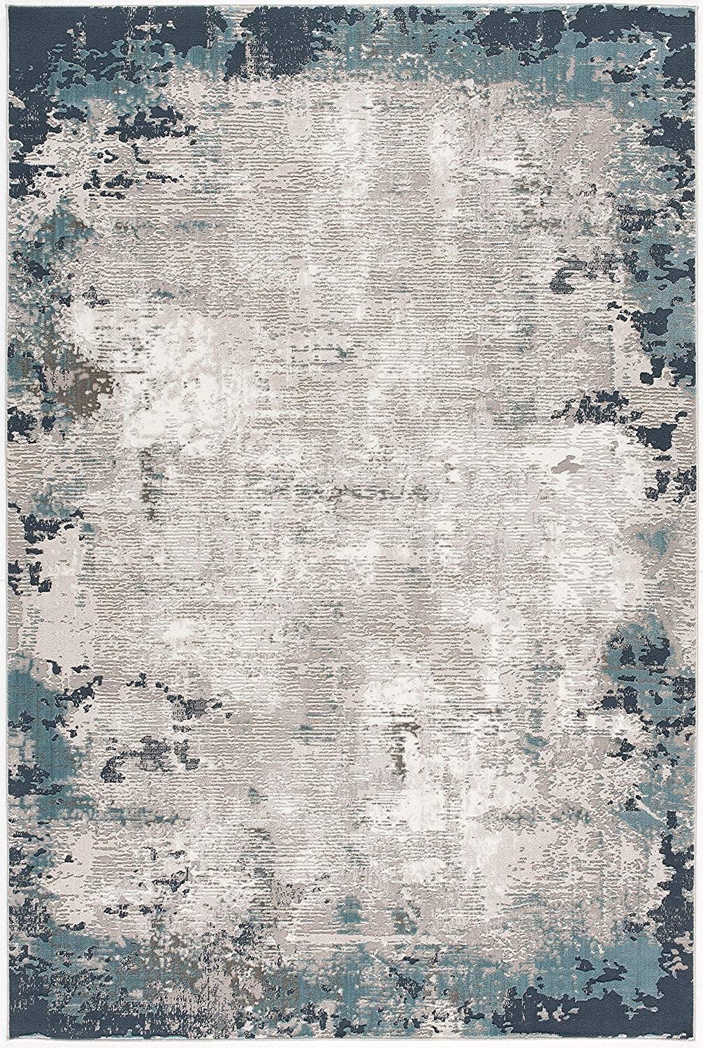 4’ x 6’ Blue and Ivory Modern Abstract Area Rug