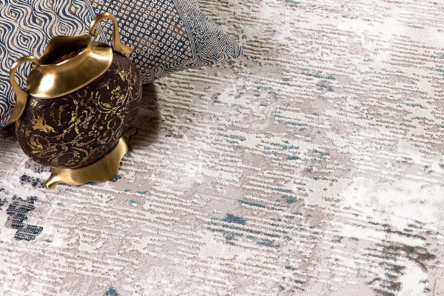 7’ x 10’ Blue and Ivory Modern Abstract Area Rug