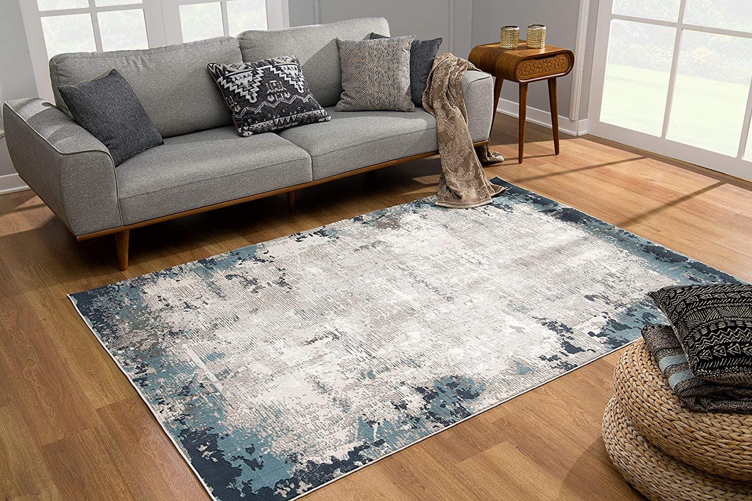 8’ x 11’ Blue and Ivory Modern Abstract Area Rug