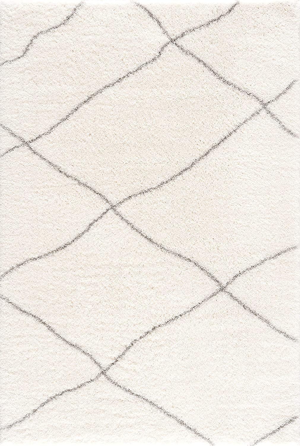 7’ x 9’ Ivory Modern Uneven Lattice Area Rug