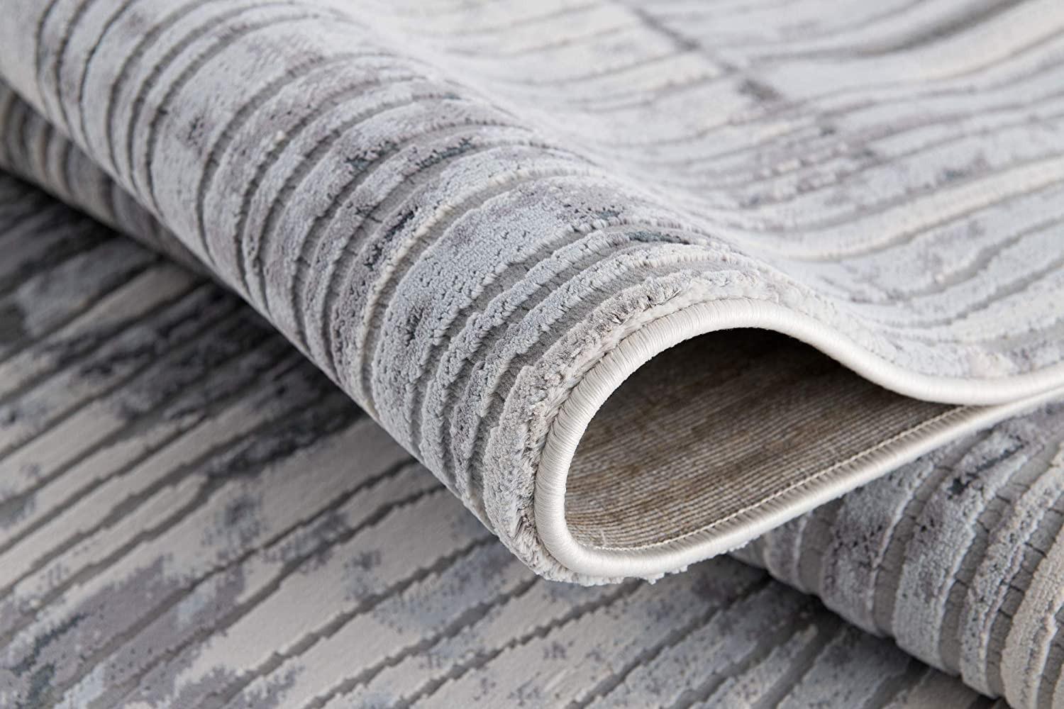 5’ x 8’ Blue Abstract Strokes Area Rug