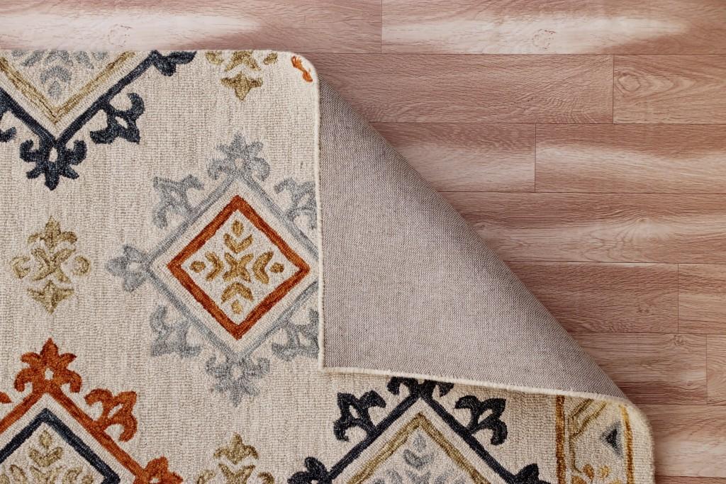 5’ x 7’ Cream and Orange Ornate Diamond Area Rug