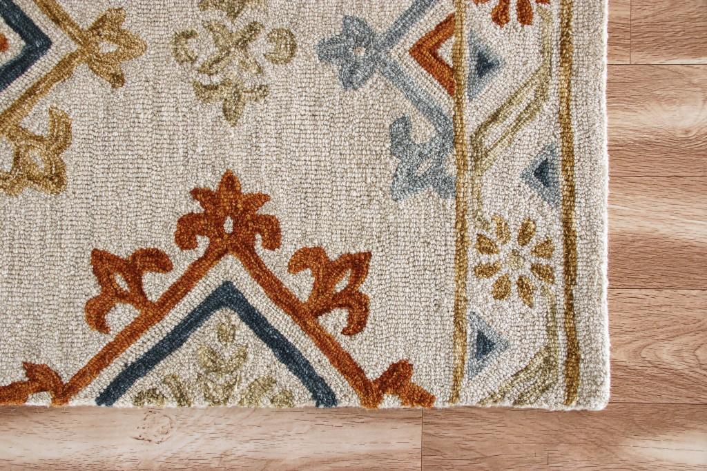 5’ x 7’ Cream and Orange Ornate Diamond Area Rug