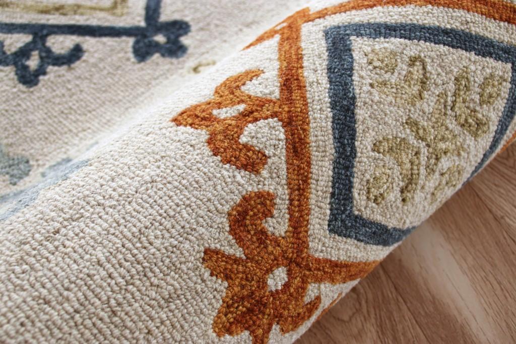 5’ x 7’ Cream and Orange Ornate Diamond Area Rug