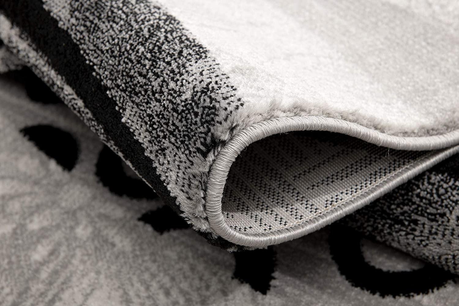 7’ x 9’ Gray and Black Abstract Waves Area Rug