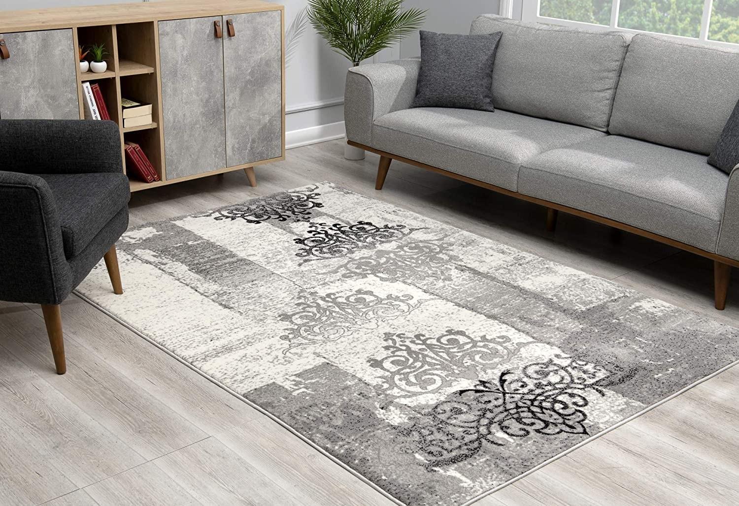 8’ x 11’ Gray Faded Filigree Pattern Area Rug