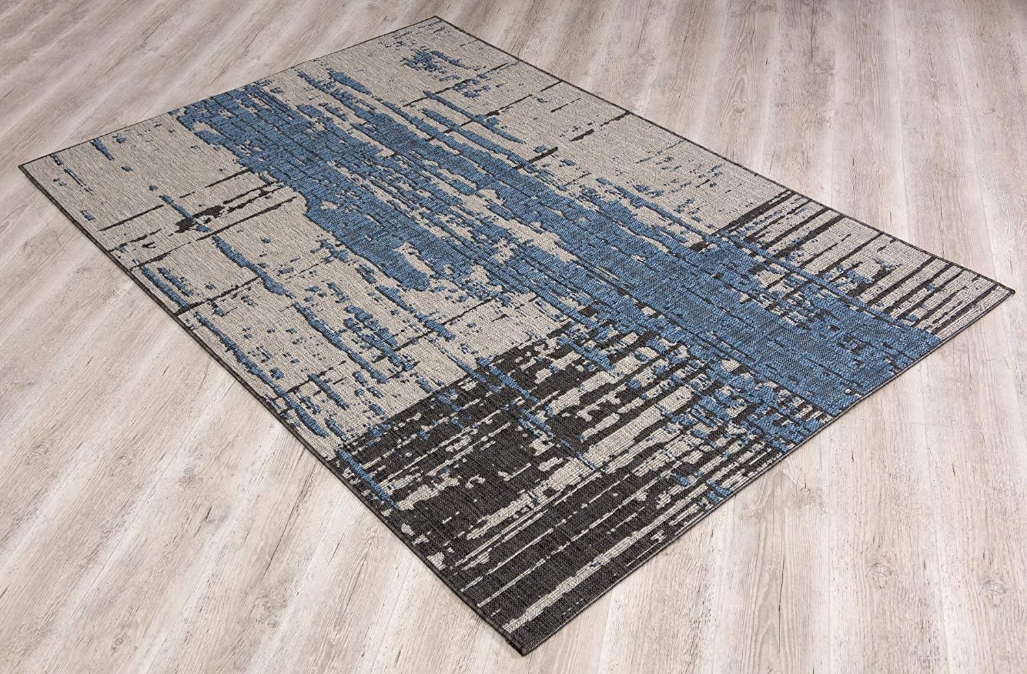 5’ x 8’ Teal Blue Abstract Textured Area Rug