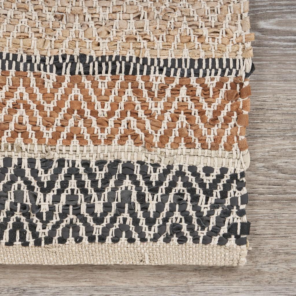 2’ x 3’ Brown and Black Ornate Striped Scatter Rug