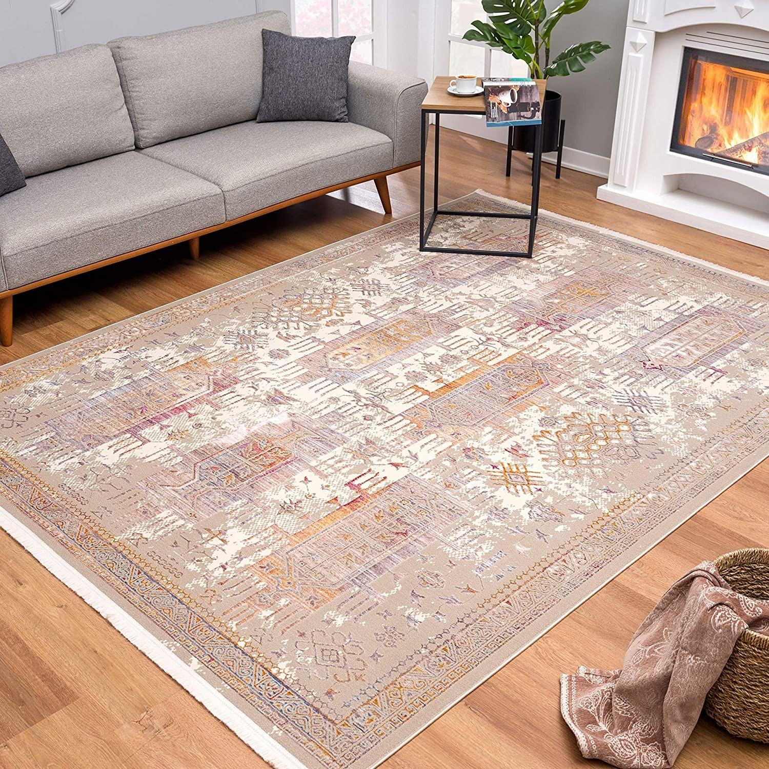 5’ x 8’ Beige Faded Tribal Motifs Area Rug