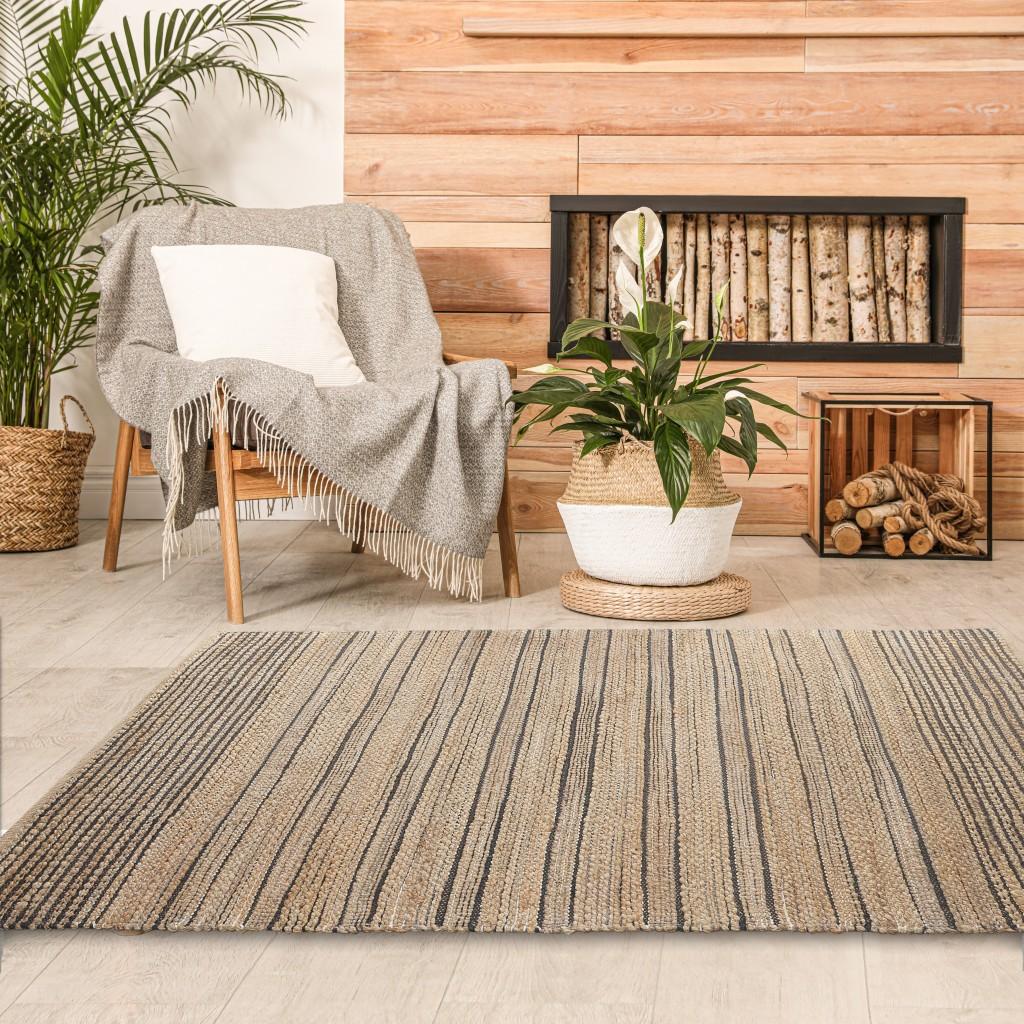 5’ x 8’ Tan and Black Eclectic Striped Area Rug