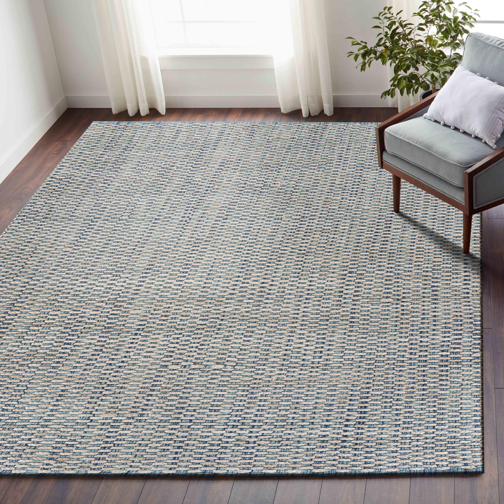 5’ x 8’ Blue and Beige Toned Area Rug