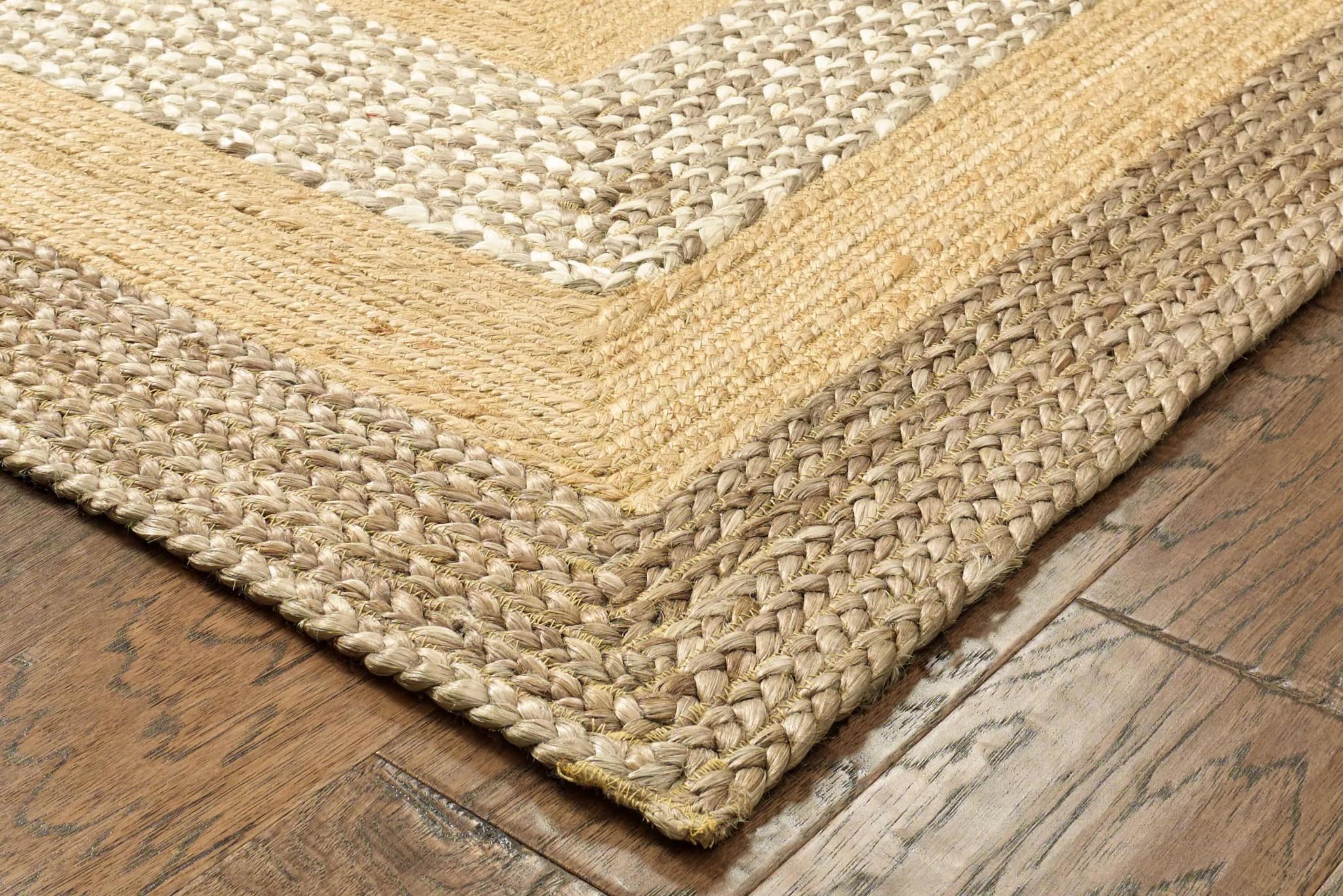 5’ x 8’ Tan and Beige Bordered Area Rug