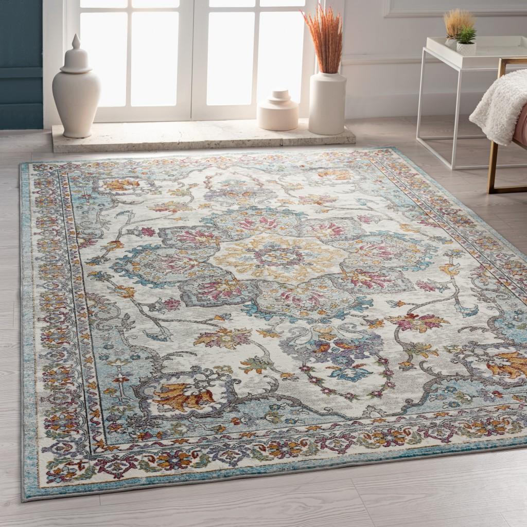 5’ x 8’ Blue and Ivory Center Medallion Area Rug