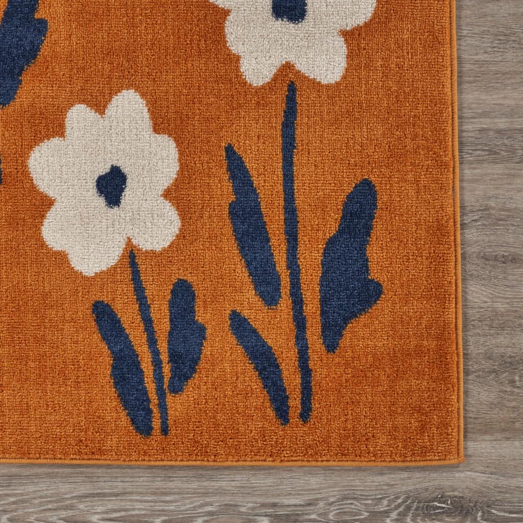 8’ x 9’ Orange and Ivory Flower Field Area Rug