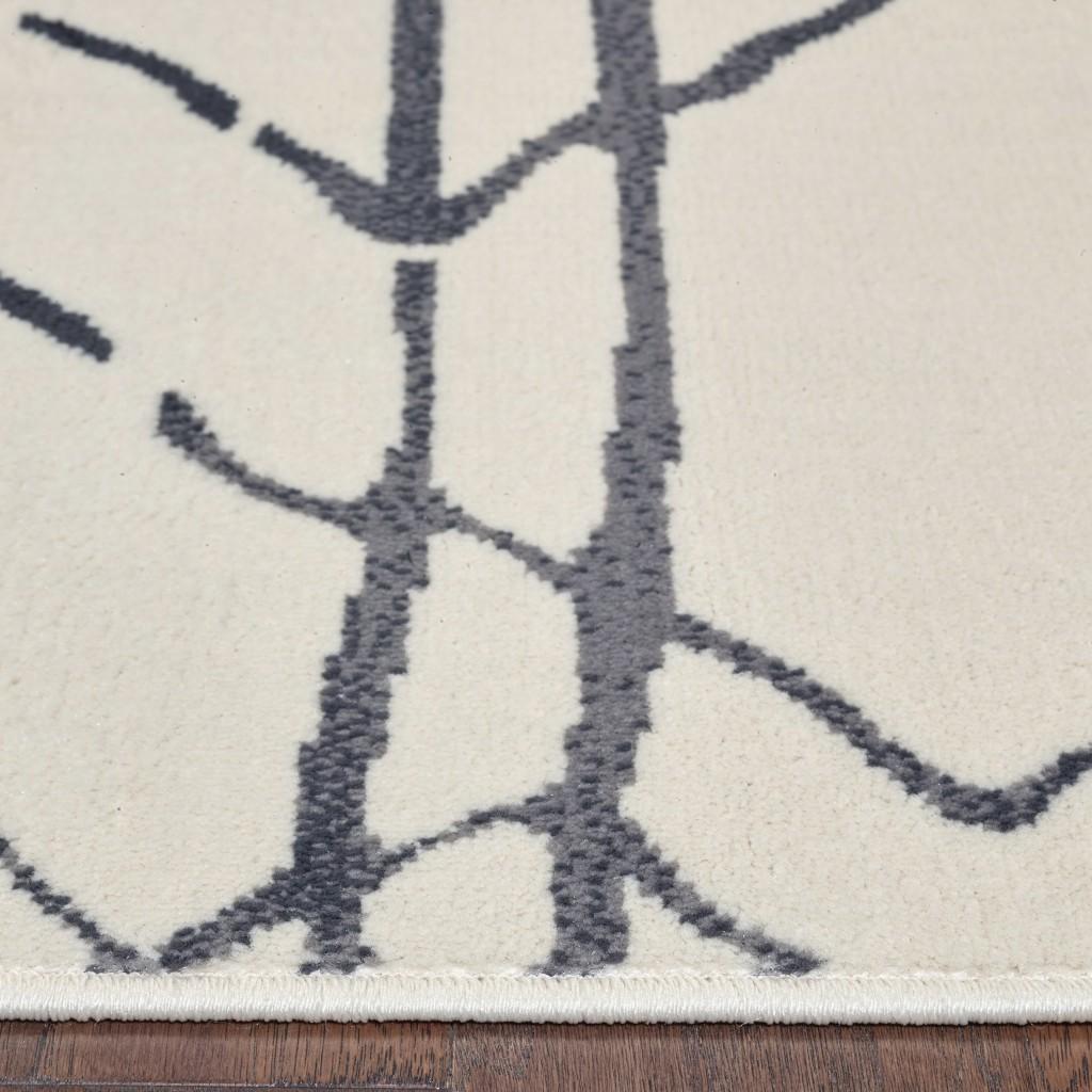 8’ x 10’ Cream and Black Berber Pattern Area Rug