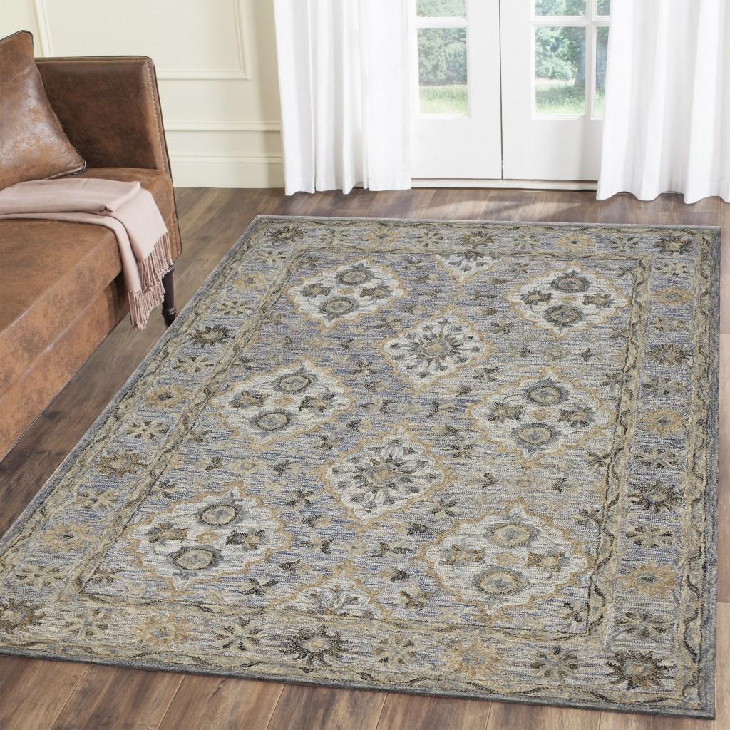 9’ x 12’ Blue and Tan Traditional Area Rug