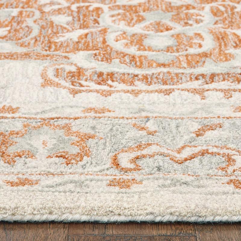 9’ x 12’ Orange and Ivory Medallion Area Rug