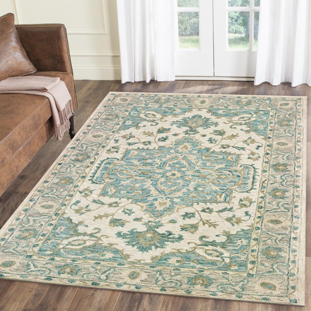 9’ x 12’ Turquoise and Cream Medallion Area Rug