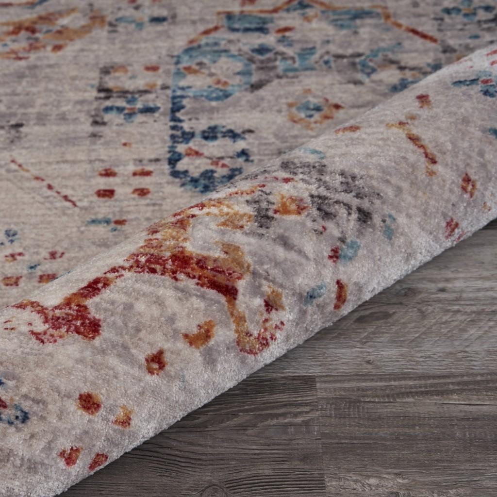 5’ x 8’ Ivory Distressed Floral Area Rug