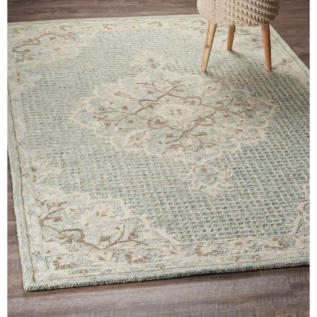 5’ x 8’ Ivory Distressed Floral Area Rug